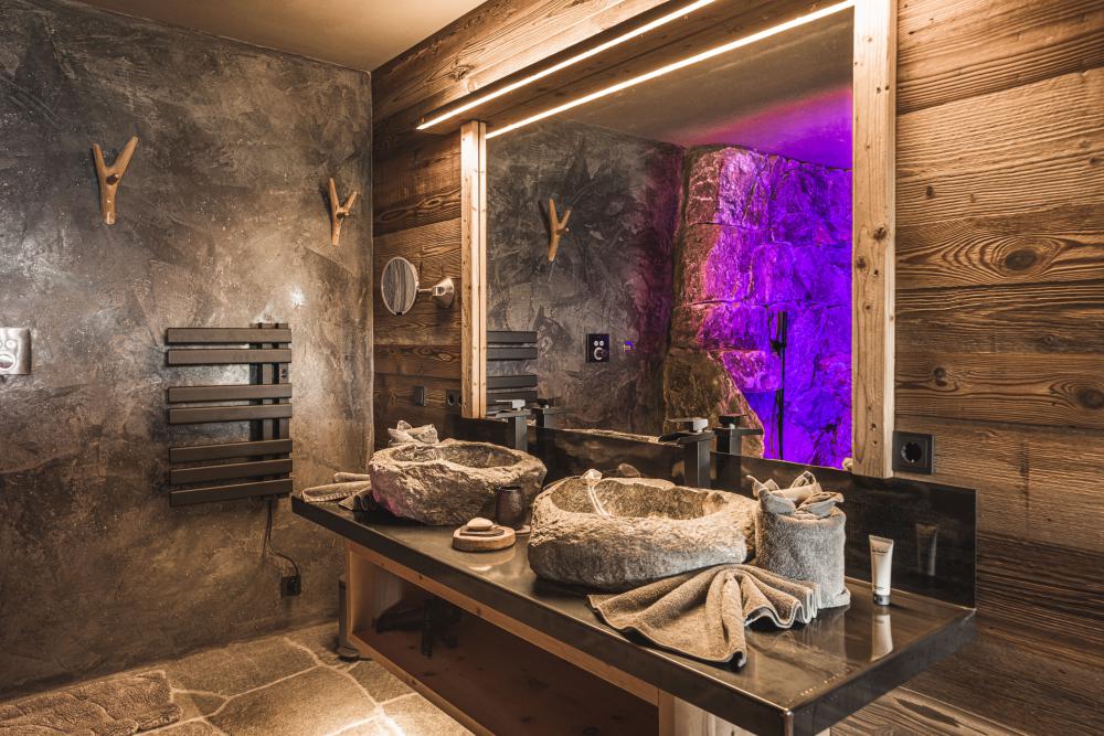 Spacious bathroom with stone sourced from the property's own grounds
