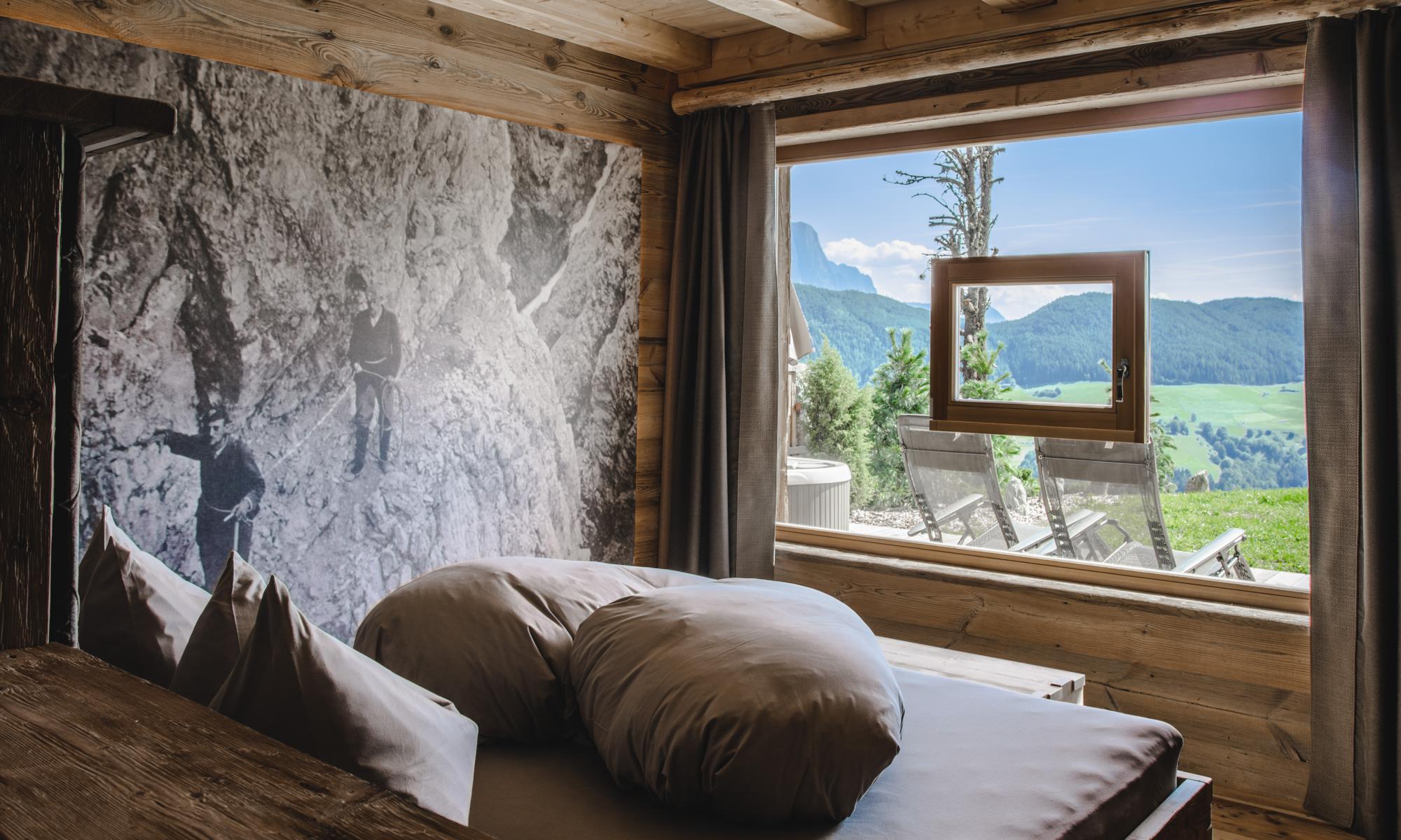 Luxus Chalets – Schlafzimmer mit großer Fensterfläche & Sternenhimmel